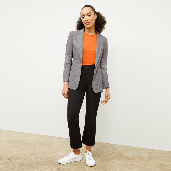 front image of a woman wearing the dolly jacket in gingham linen
