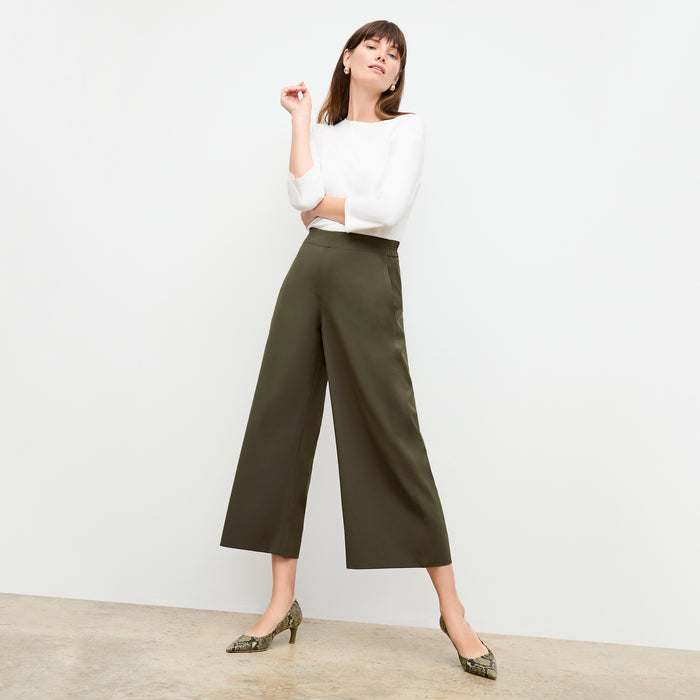 front image of a woman wearing the elena pant in olive |