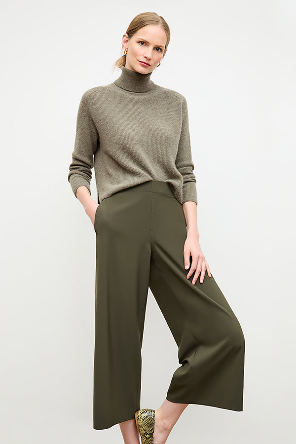 front image of a woman wearing the elena pant in olive | Exclude | Grid Hover