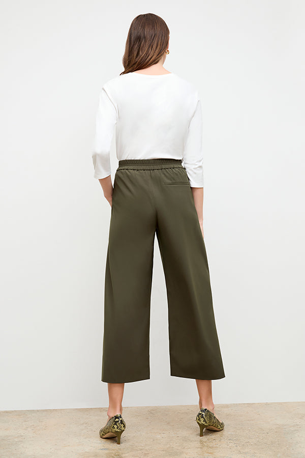 front image of a woman wearing the elena pant in olive | Exclude