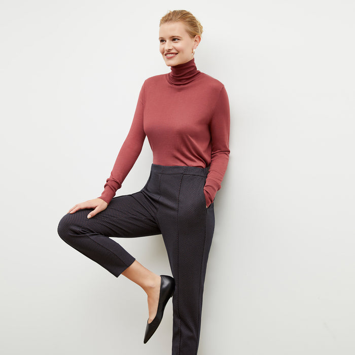 Front image of a woman wearing the Elizabeth Top in Rosewood