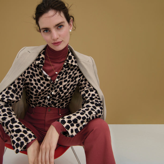Front image of a woman wearing the Elizabeth Top in Rosewood