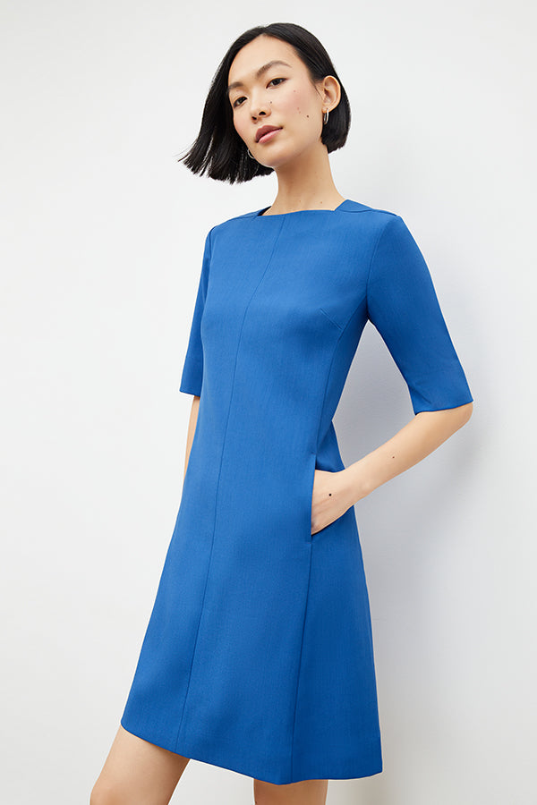 Front image of a woman in the emily dress in santorini | Exclude | Grid Hover