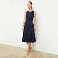 Front image of a woman wearing the Estela Dress in Night | Lead