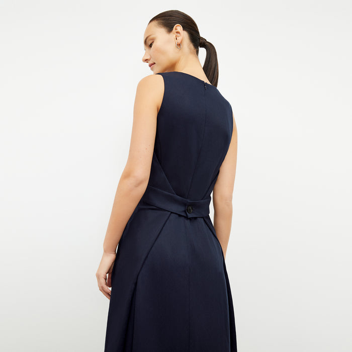 Back image of a woman wearing the Estela Dress in Night
