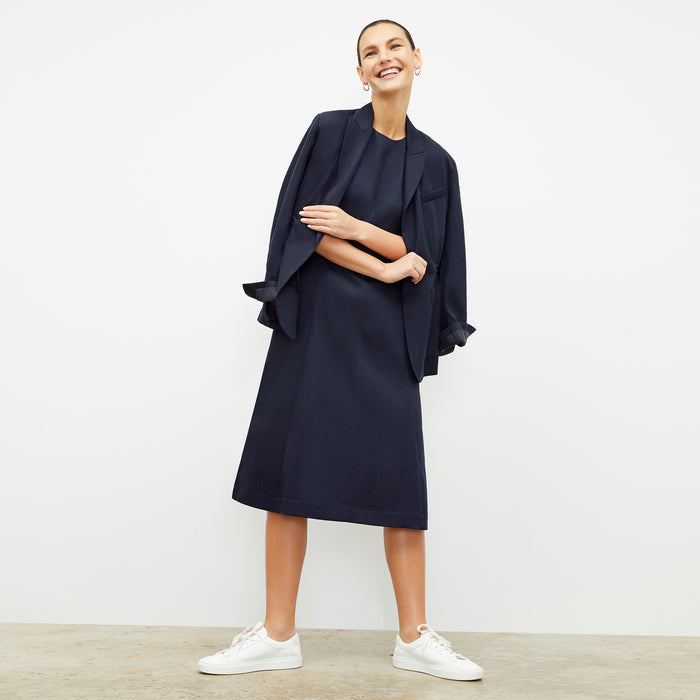 Front image of a woman wearing the Estela Dress in Night