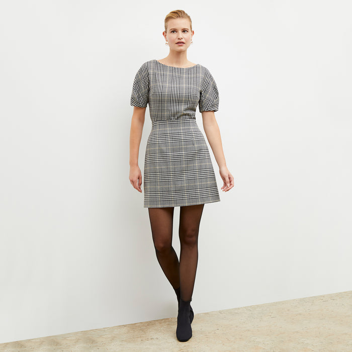 Front image of a woman wearing the eudora top in plaid sharkskin