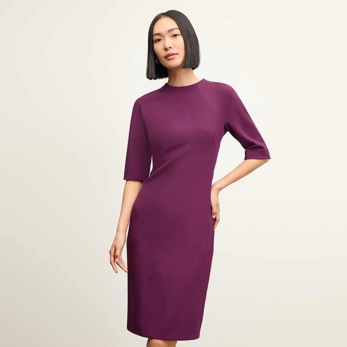front image of a woman wearing the farnoosh dress in plumberry | Lead