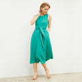 Front image of a woman wearing the Fatima Dress - Eco Heavy Crepe in Tropical Green | Lead