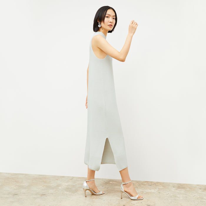 Side image of a woman wearing the Felda dress in Air