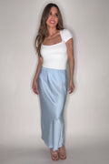 Flowy elastic waist midi skirt with a soft draped silhouette and feminine boutique style.