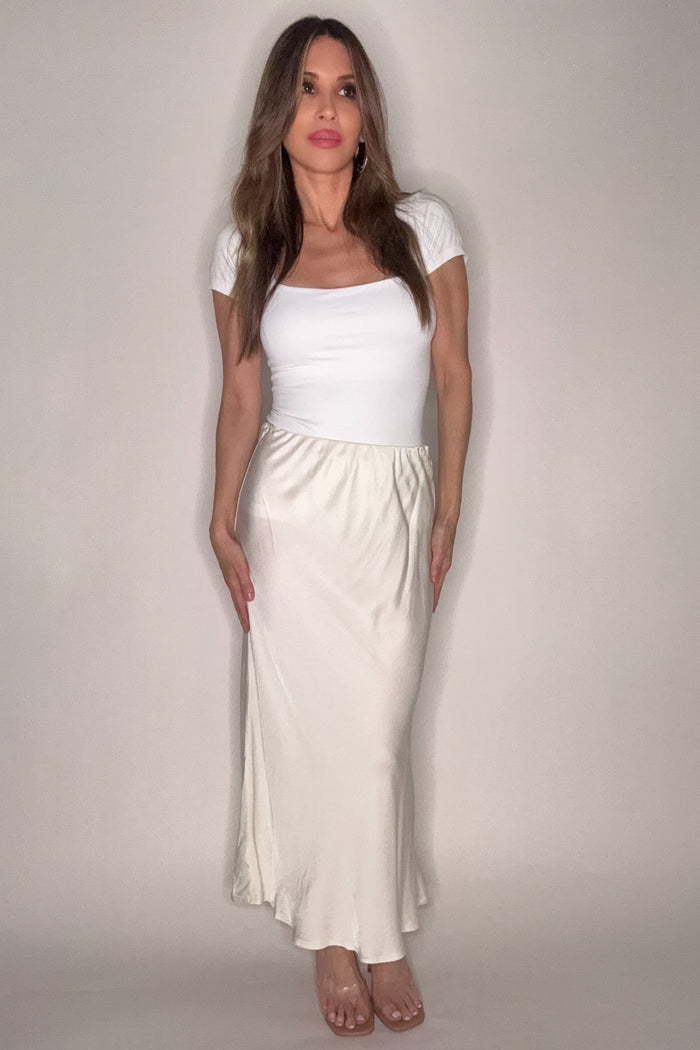 Style the Flowy Elastic Waist Midi Skirt exclusively at Born To Glam