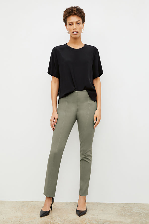 Front image of a woman wearing the foster pant in thyme | Exclude
