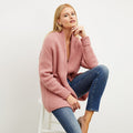 Front image of a woman wearing the frederick cardigan in himilayan salt | Lead