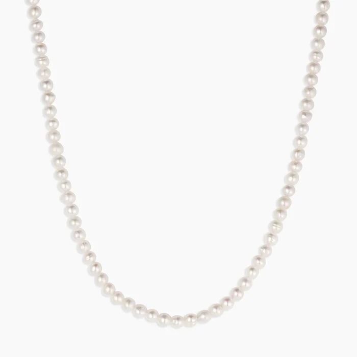 Pearl necklace on a white background