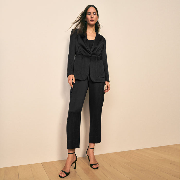 mood image of a woman wearing the hyo jacket in black