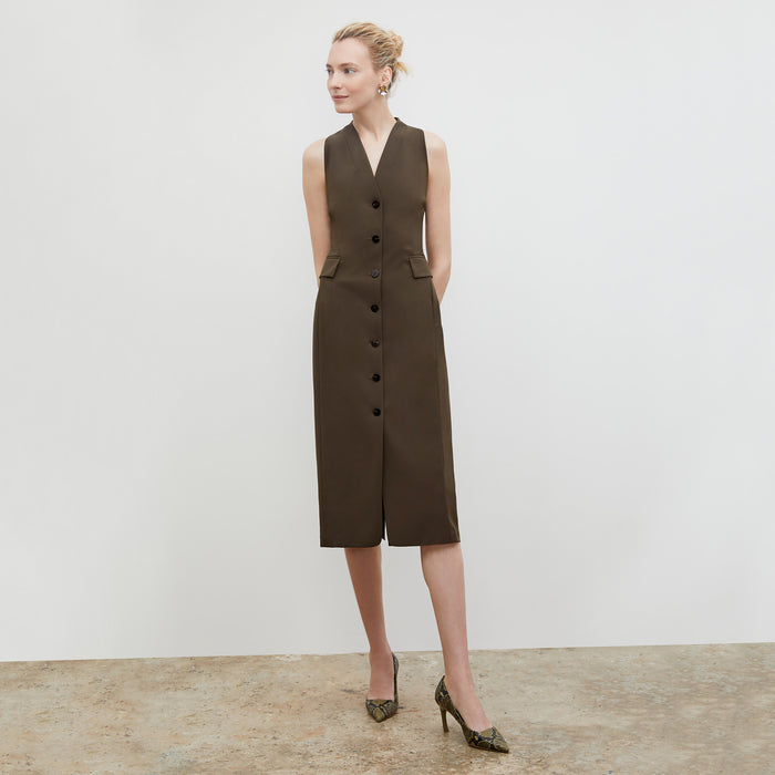 Front image of a woman wearing the Ginger Pump in Black / Olive