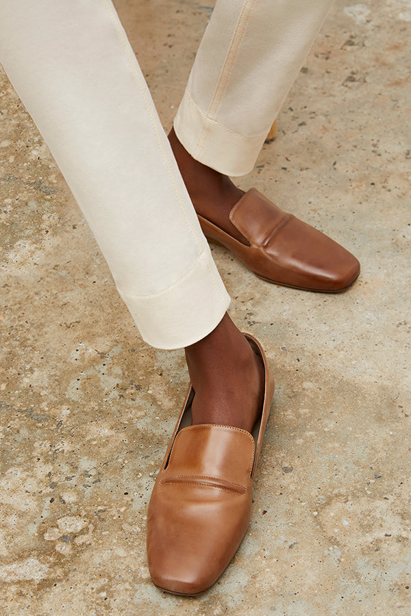 Front image of a woman wearing the Grace Loafer in Cognac | Grid Hover | Exclude