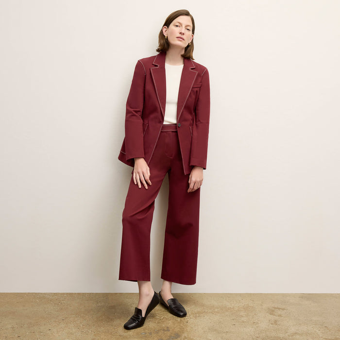 front image of a woman wearing the grenville jacket in berry jam