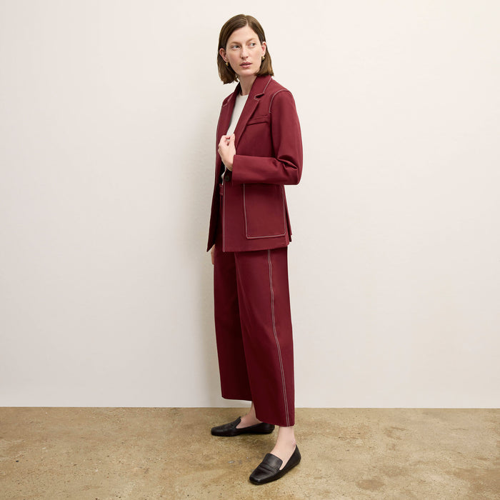 front image of a woman wearing the grenville jacket in berry jam