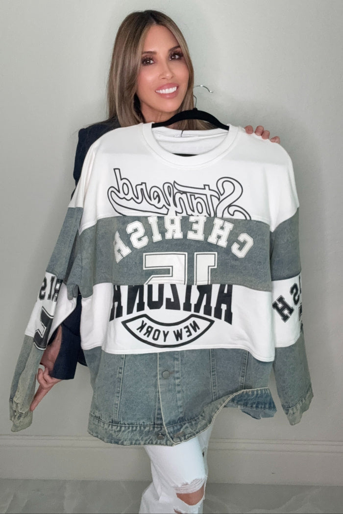Half Denim Sporty Sweatshirt jacket with denim accent panels, athletic graphic print details, and a snap button hem.