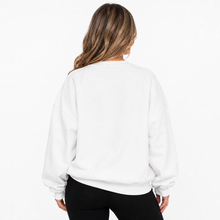 Back view of white Halloween pumpkin sweatshirt showing the plain rear design on a clean white studio background.