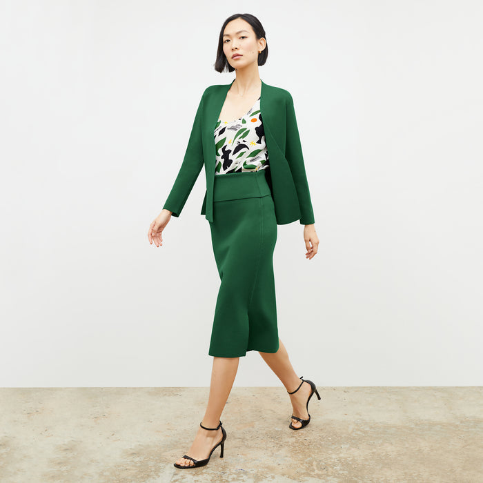 Front image of a woman wearing the harlem skirt in vine