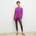 Front image of a woman wearing the harrington in brown | Lead