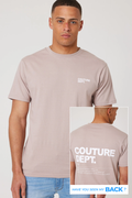 A man wears a Haydon Walk Regular Fit Cotton T-Shirt in beige with a small left chest logo and a large COUTURE DEPT. print on the back. Blue text below says, "Have you seen my back?".