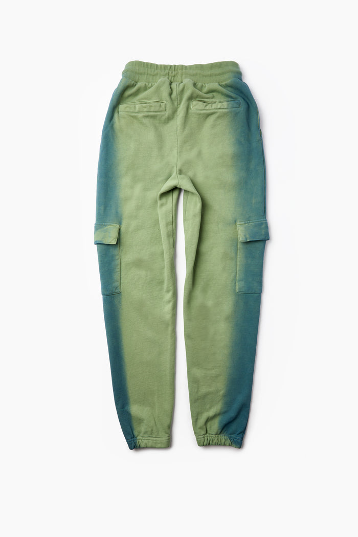 Heavy Weight Oversized Couture Department Joggers in green, featuring two back and two side pockets with a blue gradient on the lower tapered legs, shown flat on a white background.