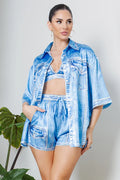 Denim-effect three-piece lingerie set with a boxy shirt jacket, triangular bralette, and relaxed high-rise shorts.