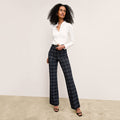 front image of a woman wearing the horton pant in black/white | Lead