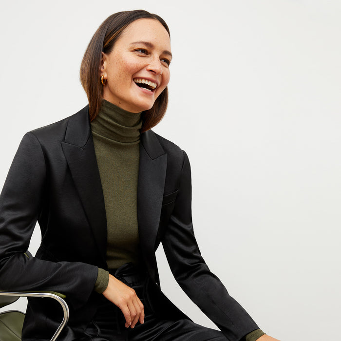 Image of a woman wearing the Hyo Jacket in Black