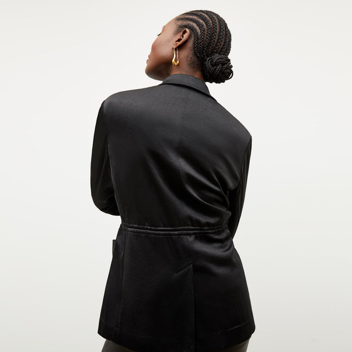 Image of a woman wearing the Hyo Jacket in Black