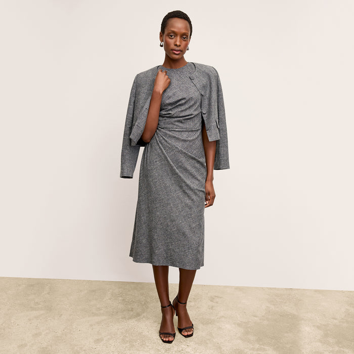 front image of a woman wearing the jeannine dress in black/white