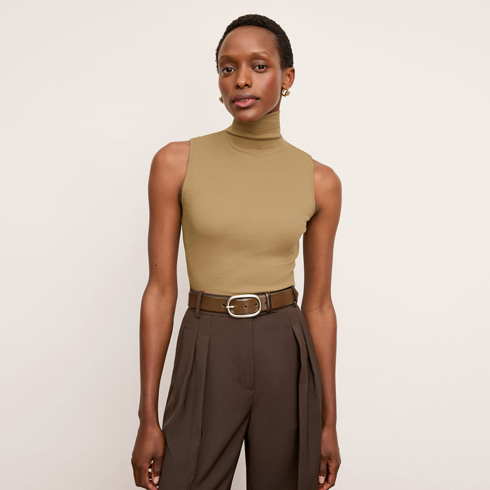 Front image of a woman wearing the Jett Tank in Saddle | Lead