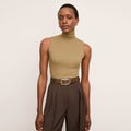 Front image of a woman wearing the Jett Tank in Saddle | Lead