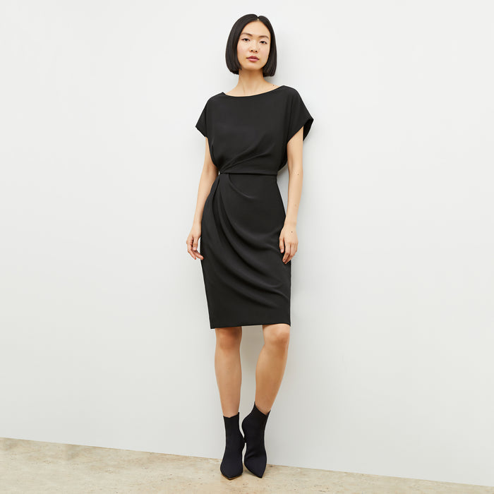 Front image of a woman wearing the jillian dress in black | Lead