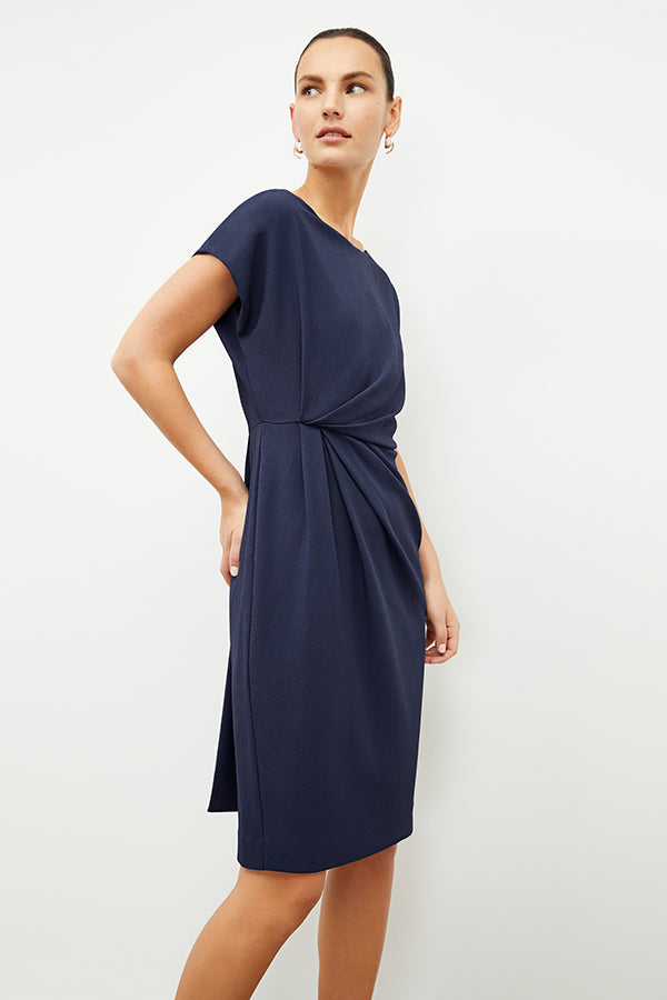 front image of a woman wearing the jillian dress in caspian blue | Exclude | Grid