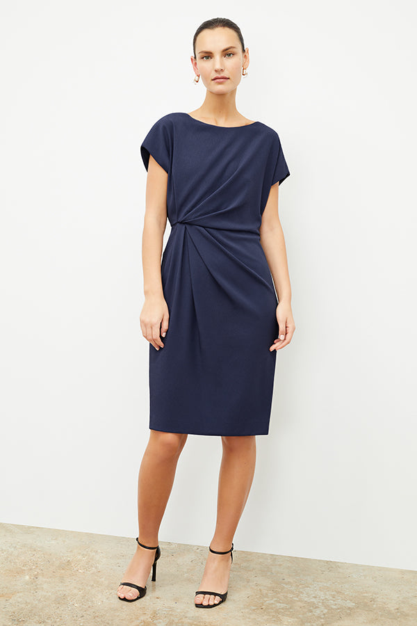 front image of a woman wearing the jillian dress in caspian blue | Exclude | Grid Hover
