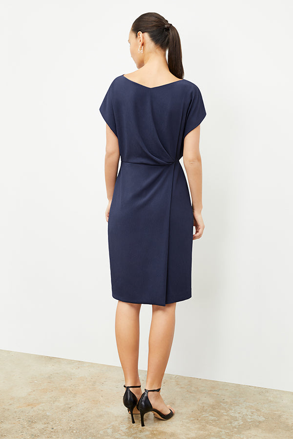 back image of a woman wearing the jillian dress in caspian blue | Exclude