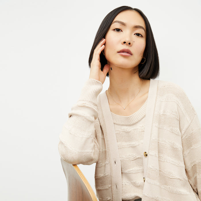 front image of a woman wearing the jo sweater in moonbeam