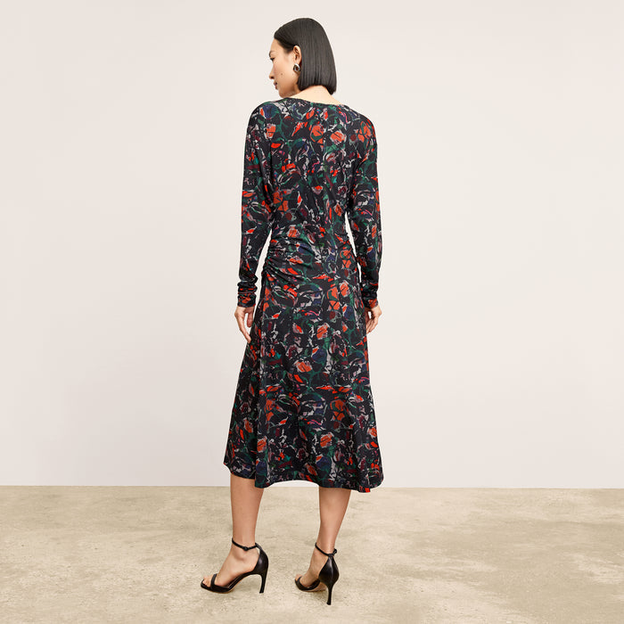 back image of a woman wearing the johnna dress in splatter pop