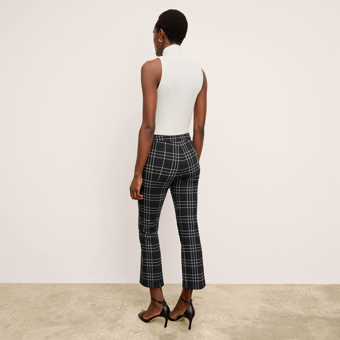 image of a woman wearing the kick flare foster pant in plaid