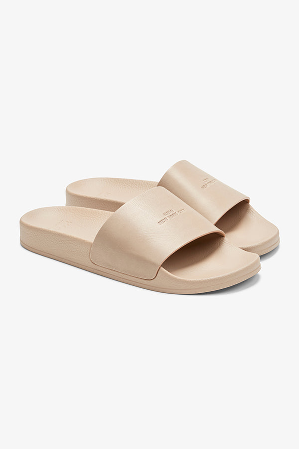 Packshot image of the KOIO Elba Slide - Leather in Taupe | Grid | Exclude | Still
