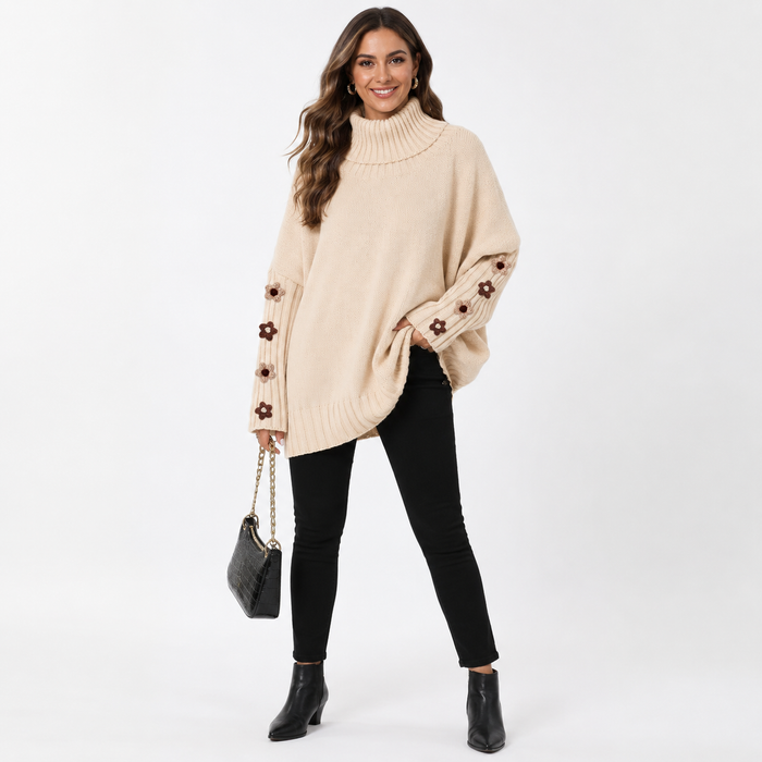 Apricot women's high-neck knit sweater with floral sleeve details shown full-body on a clean white studio background.