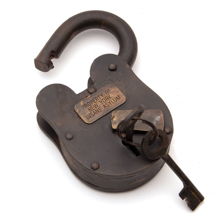 massive steel lock is fully functional with a badge â€œProperty Of New York Insane Asylumâ€ includes 2 keys similarly antiqued
