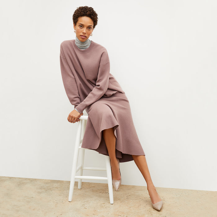 Front image of a woman wearing the leah skirt in rose taupe