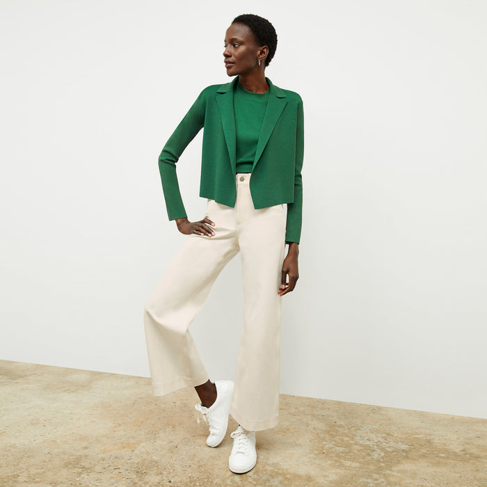 front image of a woman wearing the leslie tee in vine