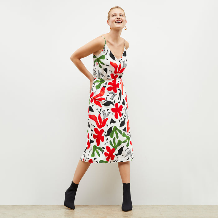 Front image of a woman wearing the lisey top in cutout print